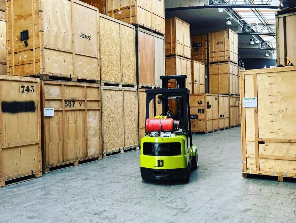 Storage boxes and a machine