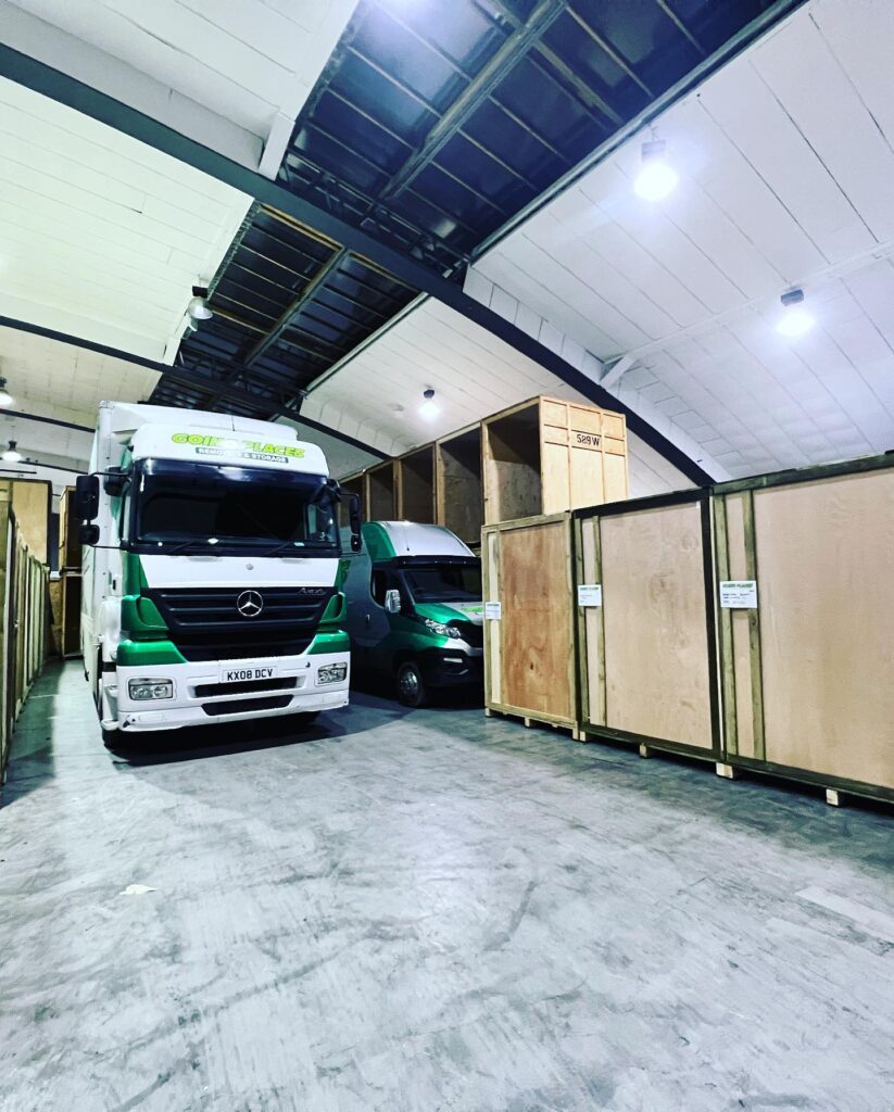 Going Places Removals car and boxes in Truro