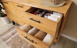 Will movers move dressers with clothes in them?